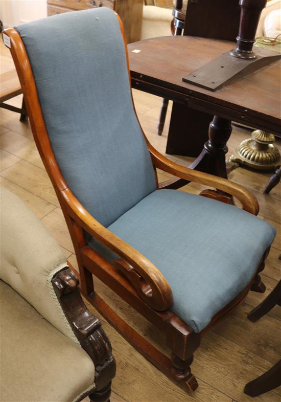 A Victorian mahogany rocking chair